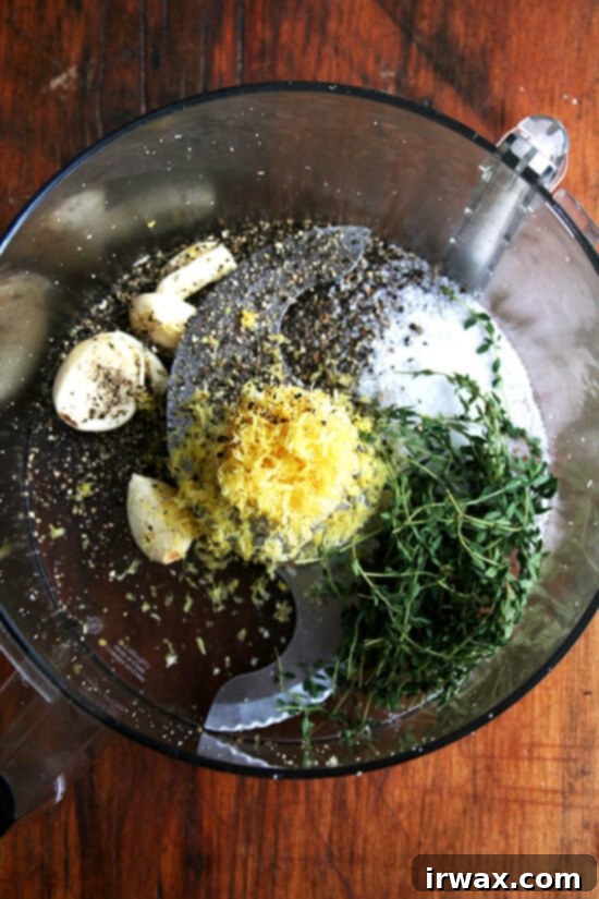 Κοτόπουλο Μουσταρδοψητό της Ίνα Γκάρτεν 2 Food processor with lemon zest, garlic, salt, pepper, and thyme — this seasoning mix will flavor the bread crumbs.