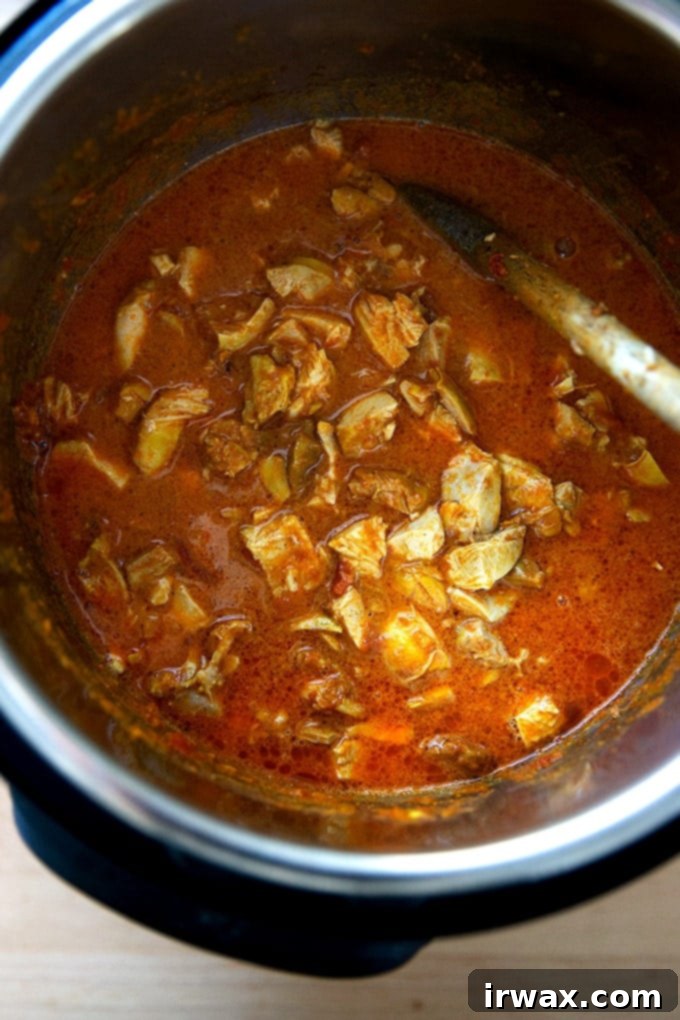 Σε Χρόνο Μηδέν: Μπάλι Τσίκεν ή Ρεβύθια 13 Μια Instant Pot γεμάτη με βούτυρο κοτόπουλο.
