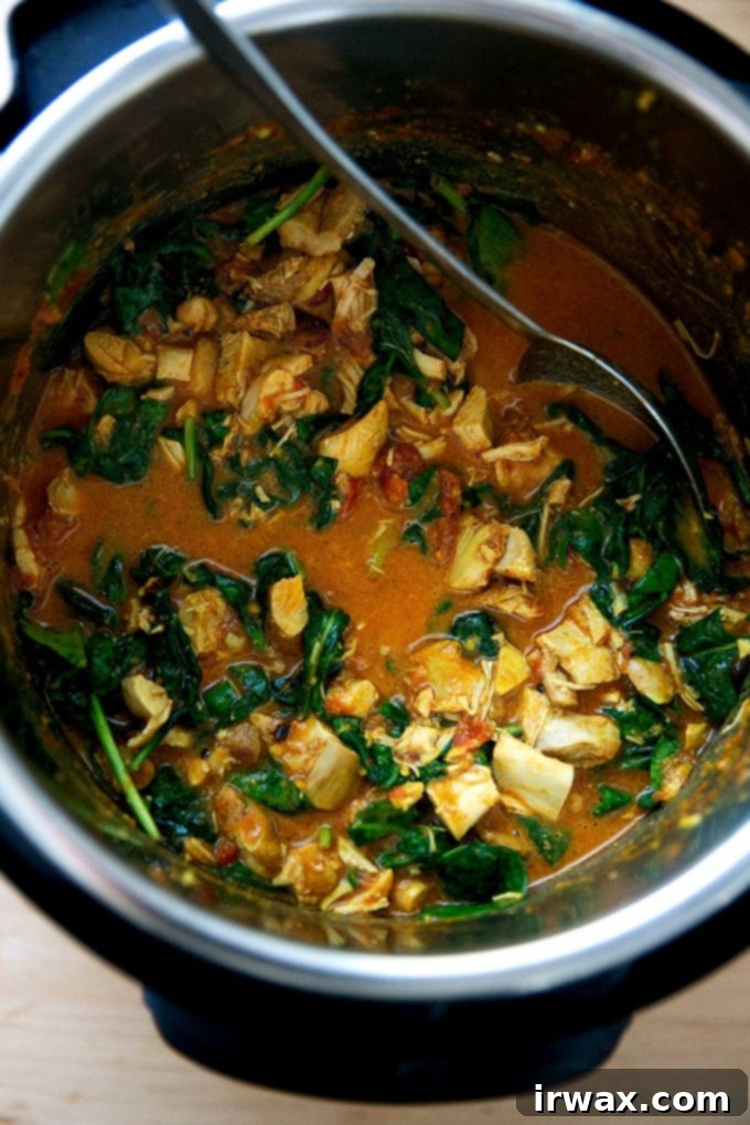 Σε Χρόνο Μηδέν: Μπάλι Τσίκεν ή Ρεβύθια 15 Μια Instant Pot γεμάτη με βούτυρο κοτόπουλο και μαραμένο σπανάκι.