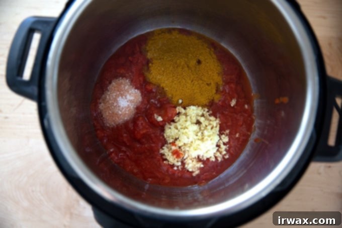 Σε Χρόνο Μηδέν: Μπάλι Τσίκεν ή Ρεβύθια 6 Μια Instant Pot γεμάτη με τα υλικά της σάλτσας για βούτυρο κοτόπουλο.