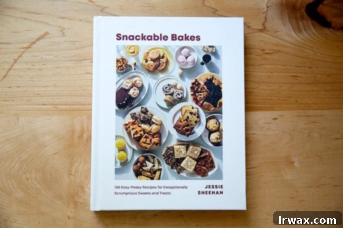 Οδηγός Δώρων για την Ημέρα της Μητέρας 2022 7 Snackable Bakes cookbook on a countertop.