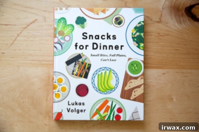 Οδηγός Δώρων για την Ημέρα της Μητέρας 2022 8 Snacks for Dinner cookbook on the countertop.