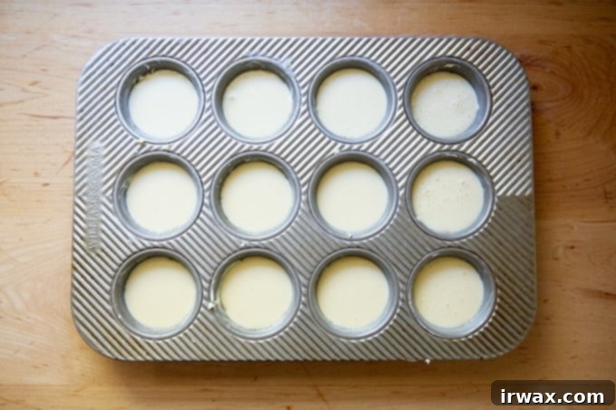 Φουσκωτά Γιορκσάιρ 7 Ζύμη Popover σε ταψί για μάφιν.