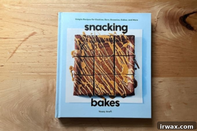 Οδηγός Δώρων 2023 24 Snacking Bakes, ένα βιβλίο μαγειρικής.